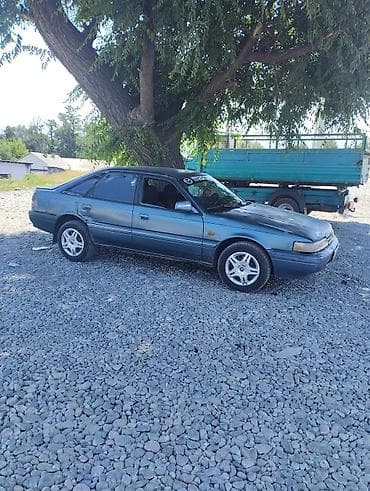 tayota progres: Mazda 626: 1991 г., 2 л, Механика, Бензин, Седан — 1