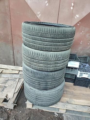 Колпаки: Комплект летних шин R22" Continental - Размер: 275/35 R22, 315/30 — 3