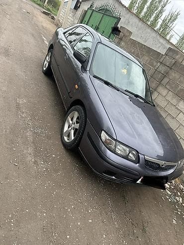 e6 3: Mazda 626: 1998 г., Седан — 2