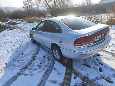 бардачок для скутера: Mazda Cronos: 1997 г., 1.8 л, Механика, Бензин, Хэтчбэк — 1