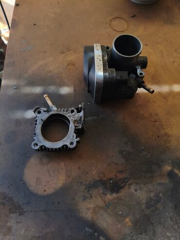 дросселя: Дроссельная заслонка Volkswagen 2001 г., Б/у, Оригинал, Германия — 2