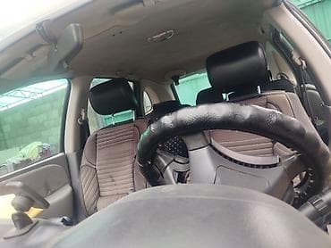 тез арада: Nissan Almera Tino: 2002 г., Хетчбек — 5