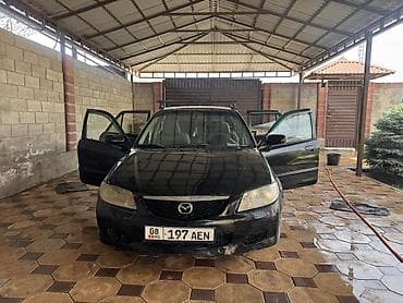 маш: Mazda 323: 2000 г., 1.6 л, Бензин, Хэтчбэк — 4