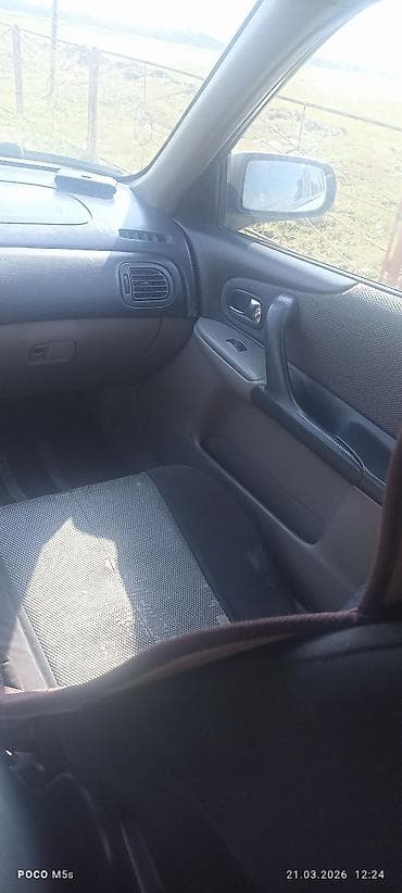 chery tiggo: Mazda 323: 2003 г., 1.6 л, Ручные, Бензин, Хэтчбэк — 6