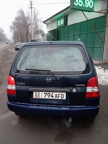 новое авто: Mazda Demio: 2002 г., 1.3 л, Механика, Бензин, Хэтчбэк — 2