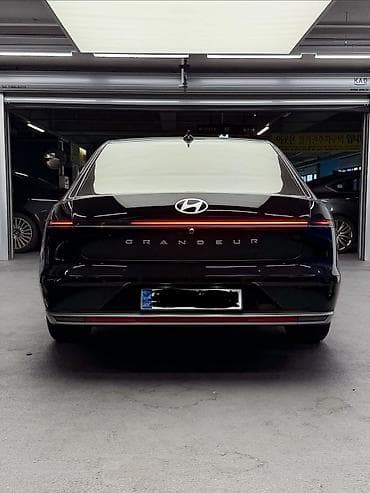 byd e7: Hyundai Grandeur: 2023 г., 1.6 л, Автомат, Гибрид, Седан — 5