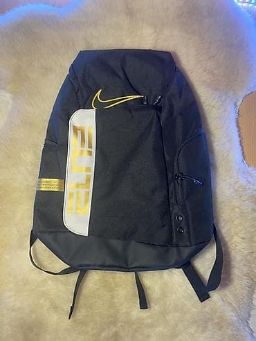 nike tech flece: Рюкзак Nike Elite черного цвета с желтыми акцентами. Модель — 1