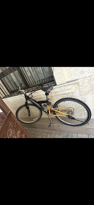 Горный велосипед с задней амортизацией (двухподвес). Особенности: -