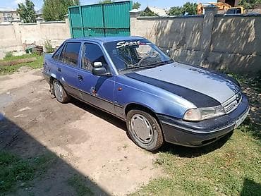 два авто: Daewoo Nexia: 2008 г., 1.5 л, Седан — 4