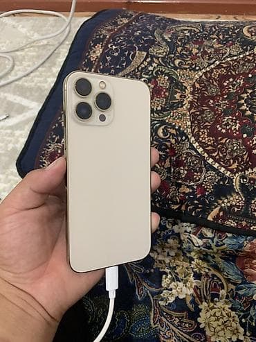 iphone 13 pro max сколько стоит: IPhone 13 Pro Max, 128 ГБ, цвет светлый (похоже на Gold). На фото — 1