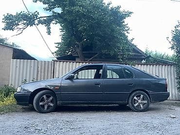 kugoo kg: Nissan Primera: 1992 г., 1.6 л, Механика, Бензин, Хэтчбэк — 2