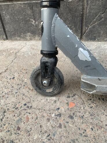 купить питбайк недорого: Простой трюковой самокат с черным рулем и серой декой. Подходит для — 5