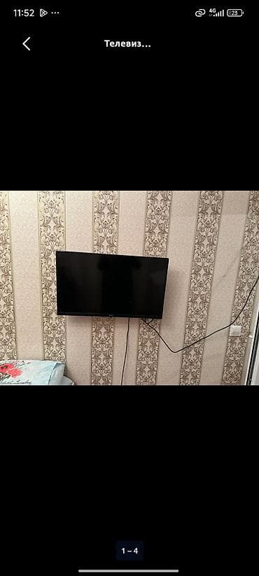 светодиодные экраны: Телевизор LED, диагональ около 32–40". Тонкая рамка, плоская панель — 2