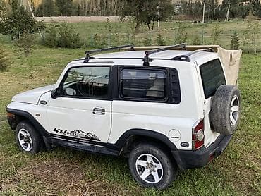 защитник: Ssangyong Korando: 2004 г., 2.9 л, Механика, Дизель, Универсал — 4