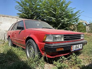 g comp: Nissan Bluebird: 1986 г., 1.8 л, Механика, Бензин, Универсал — 2