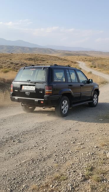 срочно продам авто в связи с переездом: Jeep Grand Cherokee: 1996 г., 5.2 л, Автомат, Бензиновая, Внедорожник — 1