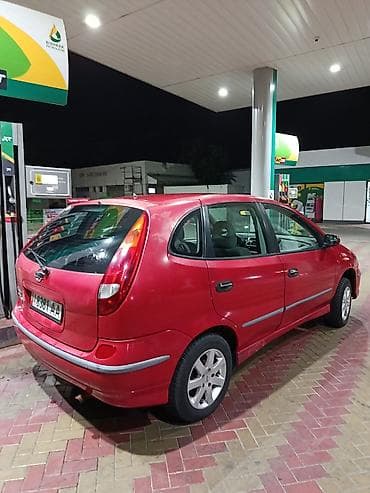 mini coper: Nissan Almera Tino: 2001 г., 1.8 л, Механика, Бензин, Хэтчбэк — 1
