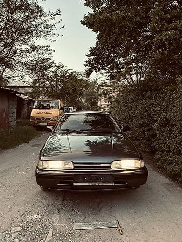 mazda 626 автомобил: Mazda 626: 1998 г., 2 л, Механика, Бензин, Хэтчбэк — 9