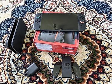 nintendo switch сколько стоит: Nintendo Switch 2 (модель OLED) — комплект для игры дома и в дороге — 1