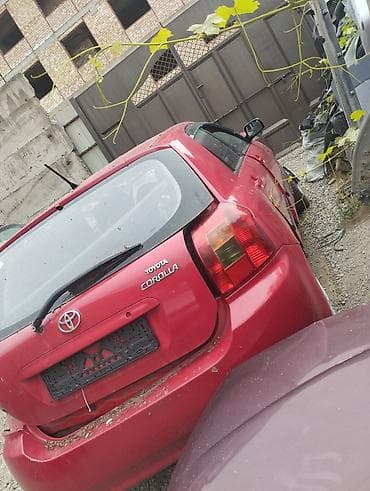 тоя пистолет: Toyota Corolla: 2002 г. — 4