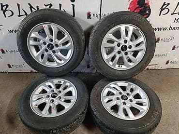 Комплект летних колес Kumho SOLUS на литых дисках Kia — 1
