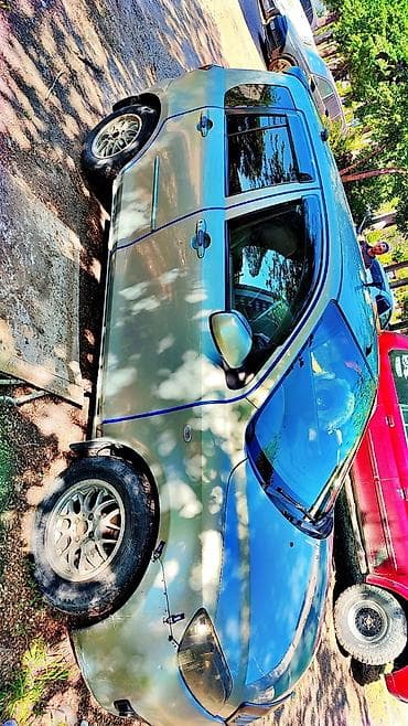 5: Mazda Demio: 2004 г., Автомат, Хэтчбэк — 8
