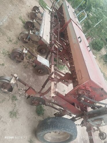 Зерновая сеялка навесная/прицепная Описание:сеялка - Механическая