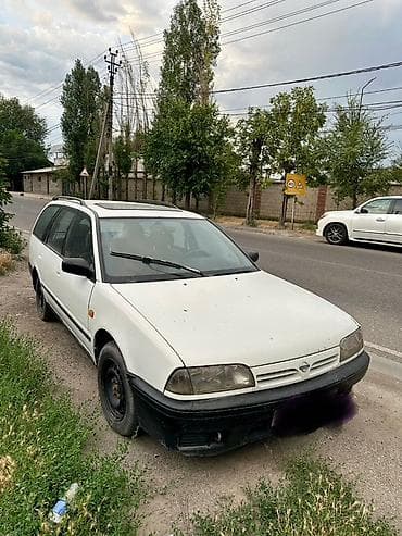 Nissan Primera: 1994 г., 1.6 л, Механика, Бензин, Универсал — 1