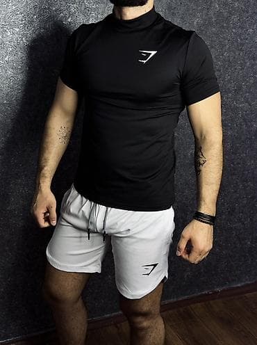 шорты тренировок: Мужская спортивная футболка с коротким рукавом и воротом-стойкой. - — 2