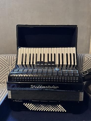 Аккордеон Weltmeister Meteor, клавишный, черный корпус. Основные