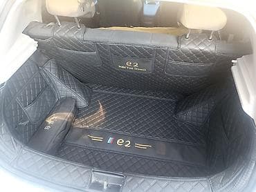 полики byd e2: Экокожа Полики Для багажника BYD, цвет - Черный, Новый — 1