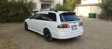 шины на эксковатор: Toyota Caldina: 1999 г., 2 л, Автомат, Бензиновая, Универсал — 1