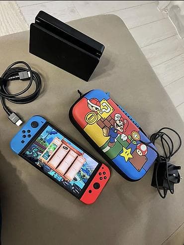 samsung 02: Nintendo Switch (OLED), неоново‑красно/синие Joy‑Con. Комплектация: - — 1