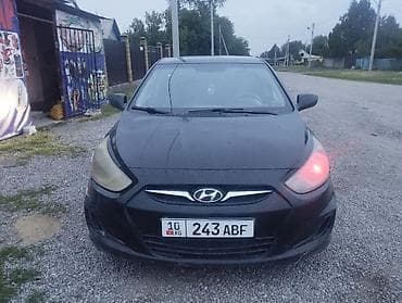 арзан машине: Hyundai Solaris: 2011 г., 1.4 л, Кол менен иштөөчү, Бензин, Хетчбек — 7