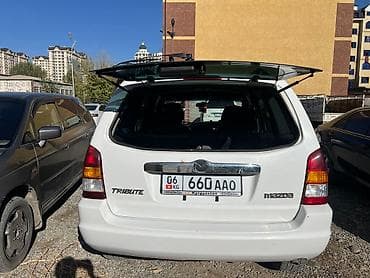 е34 2 8: Mazda Tribute: 2002 г., 2 л, Автомат, Бензин, Внедорожник — 5