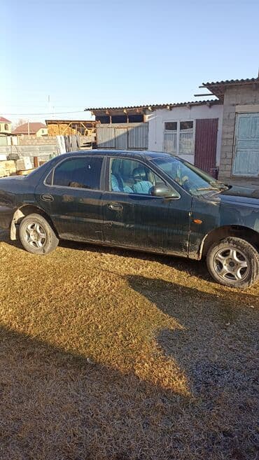 Kia Clarus: 1998 г., 1.8 л, Механика, Бензин, Седан