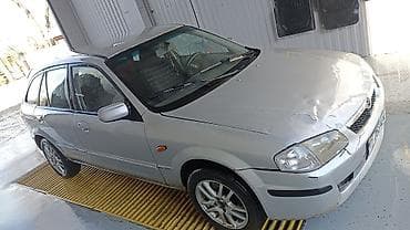 bmb 34: Mazda 323: 2000 г., Механика, Универсал — 3