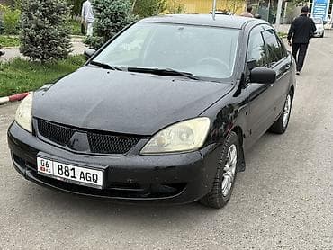 camry 2010: Mitsubishi Lancer: 2006 г., Автомат, Бензин, Седан — 6
