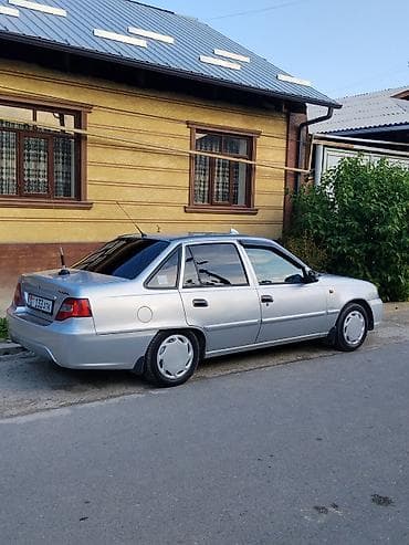 w210 e280: Daewoo Nexia: 2011 г., Седан — 3