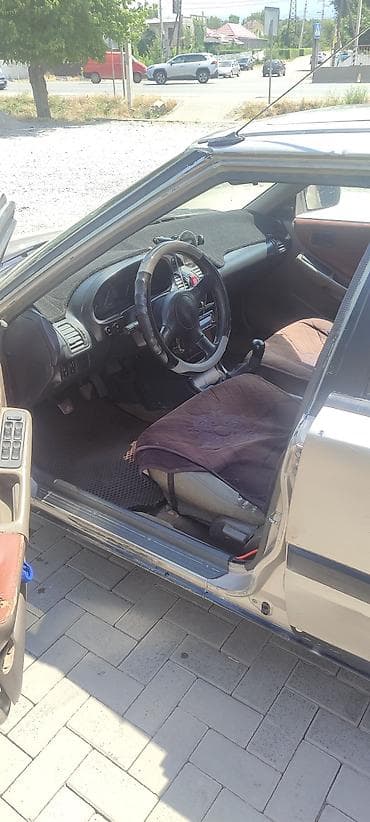 хонда истеп 1: Mazda 323: 1991 г., 1.8 л, Кол менен иштөөчү, Бензин, Хетчбек — 1
