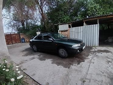 Mazda : 1995 г., 1.6 л, Механика, Бензин, Седан