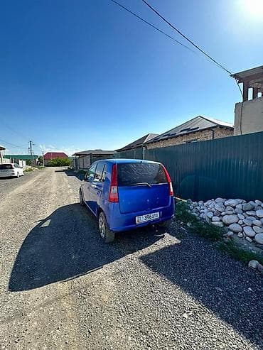 Унаа сатуу: Daihatsu Cuore: 2003 г., 1 л, Кол менен иштөөчү, Бензин, Хетчбек — 7