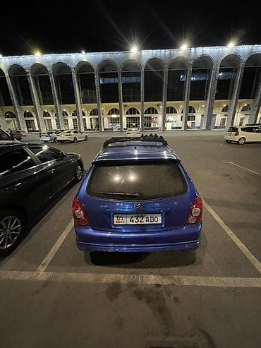 аренда mazda: Mazda 323: 2002 г., 1.6 л, Механика, Бензин, Хэтчбэк — 3