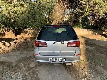 портер 2 салон: Nissan Liberty: 2003 г., 2 л, Автомат, Бензин, Минивэн — 8