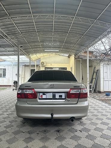 бампер mazda demio: Mazda 626: 2000 г., 2 л, Механика, Бензин, Седан — 5