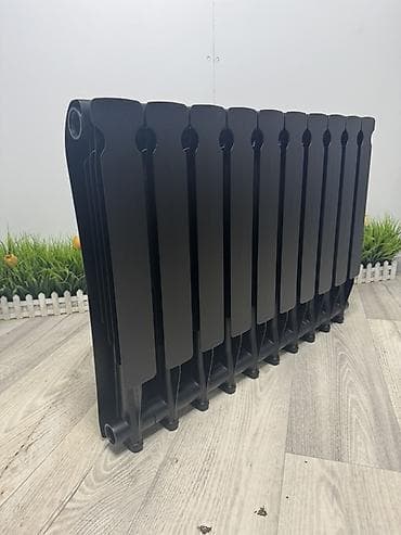 Алюминиевый секционный радиатор отопления, матовый черный цвет. -
