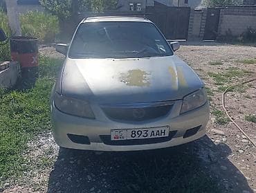 Унаа: Mazda 323: 2000 г., 1.6 л, Кол менен иштөөчү, Бензин, Хетчбек — 2