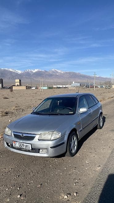 bnw x5: Mazda 323: 1998 г., 1.6 л, Механика, Бензин, Универсал — 2