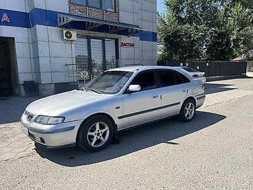 126 кузов: Mazda 626: 1997 г., Механика, Бензин, Хэтчбэк — 1