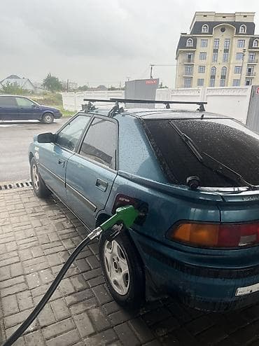 Mazda 323: 1994 г., 1.3 л, Механика, Бензин, Хэтчбэк